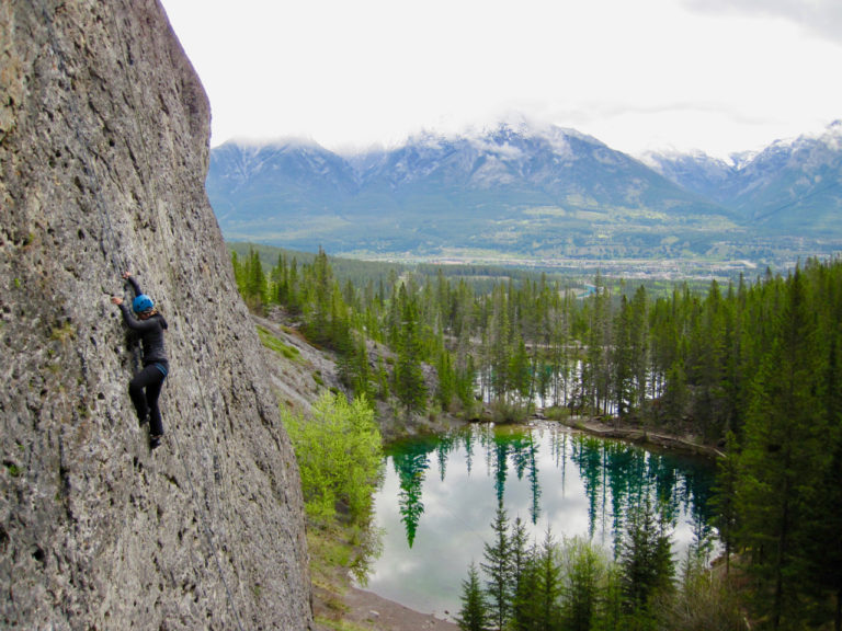 Rock climbing above Grassi Lakes on a beginner class