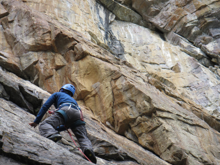 Leading a rock climb at Lake Louise during a rock climbing course