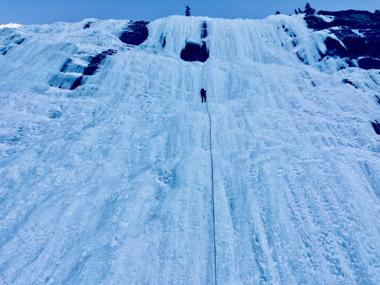 Rappelling down the steep Weeping Wall ice