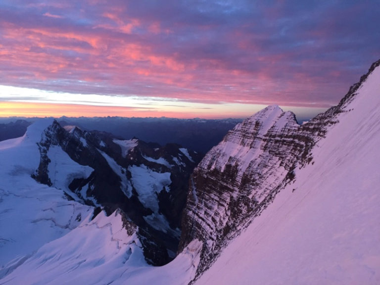 Dawn on Mt. Robson's Kain Face climbing route